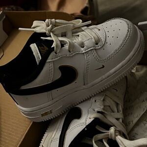 Nike White and Metallic Gold Sneakers